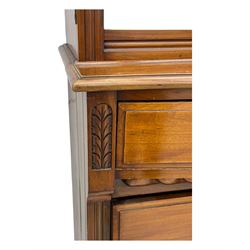 Victorian walnut dresser, projecting cornice over mirrored front, fitted with two short over two long drawers, on turned feet
