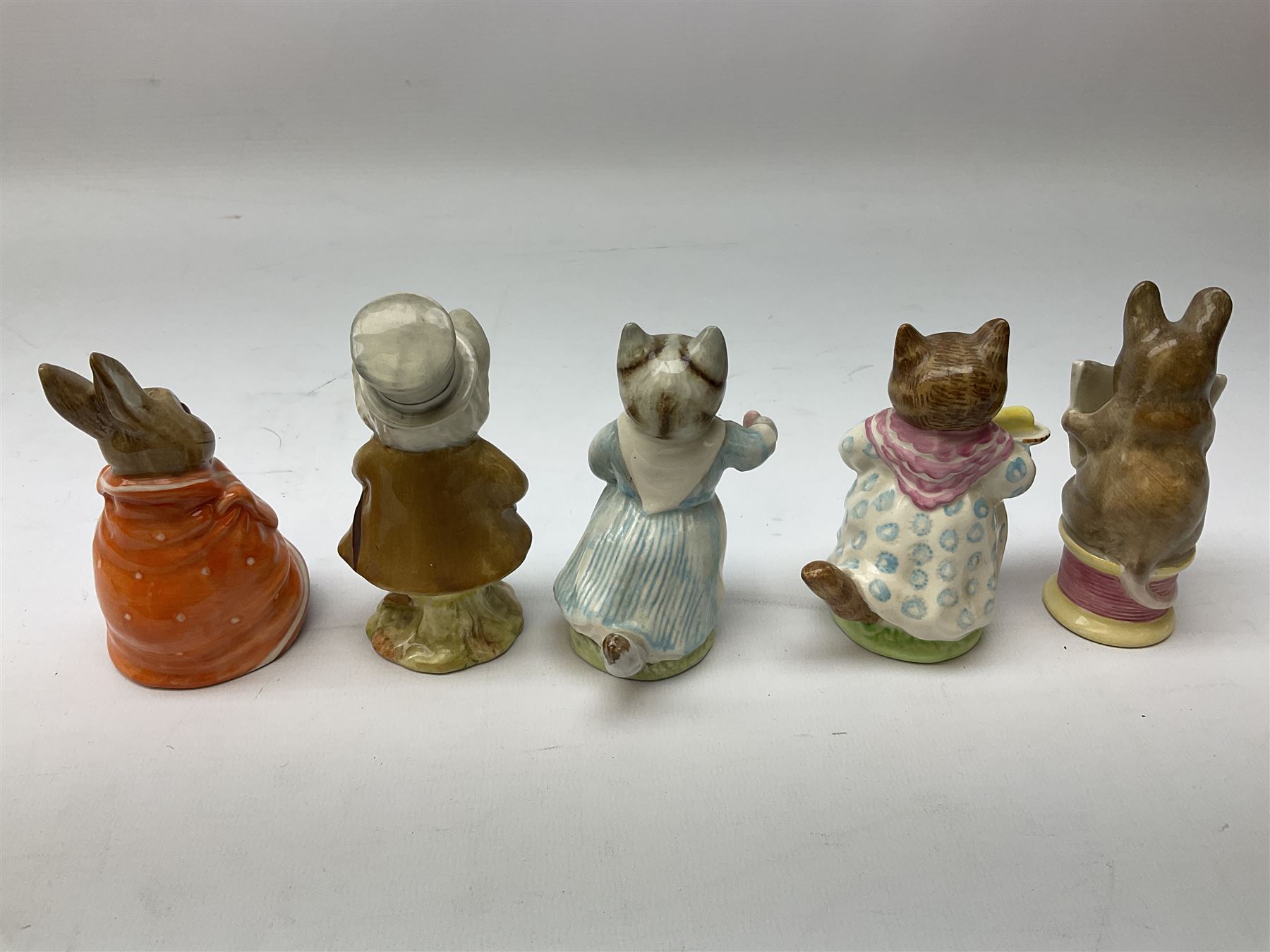 Nine Beswick Beatrix Potter figures, comprising Tabitha Twitchett, Appley Dapply, Tom Kitten Tailor of Gloucester, Ribby, Hunca Munca, Amiable guinea-pig, Miss Moppet and Poorly Peter rabbit,  all with printed mark beneath 