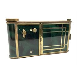 Art Deco camera shaped lady's musical compact and cigarette case, probably German, with green marble effect panels and gilt highlights, with large hinged opening to reveal engine turned brass interior with cigarette or lipstick holders, and the other side with musical mechanism and flip action powder compartment with mirror, L10cm