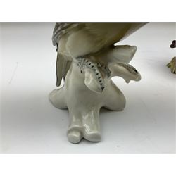 Karl Ens figure of a green woodpecker, modelled perched upon branch, model no. 7527, together with Karl Ens figure of budgie and Beswick Kingfisher no. 2371, all with printed marks beneath, tallest H25cm