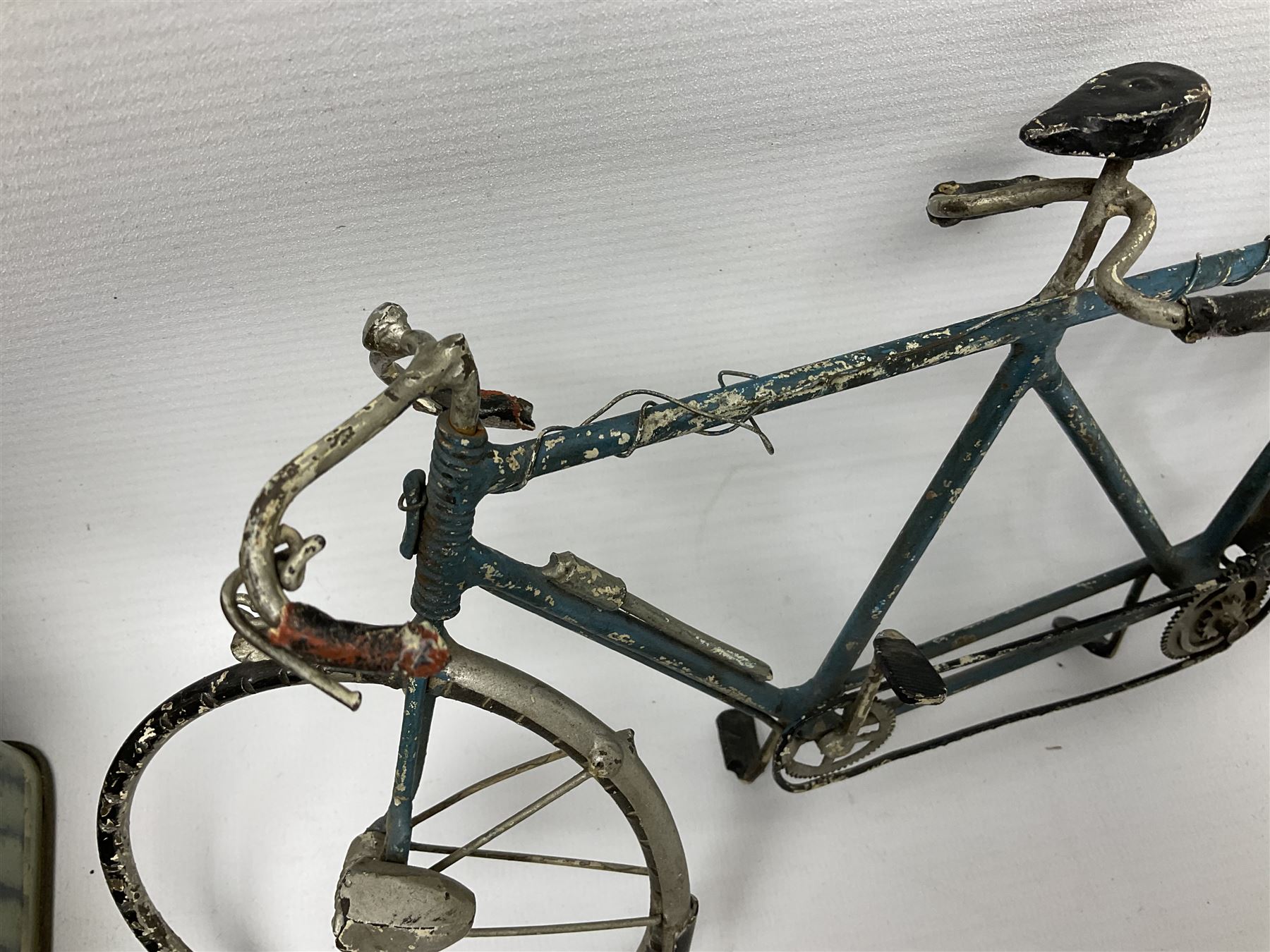 Chad Valley clockwork Fordson Major Tractor, a group of play worn Britains and other lead and metal farm animals, figures and accessories including a kennel, haystacks, dovecote, cows, sheep etc, together with a diecast model of a Tandem Bike L31cm