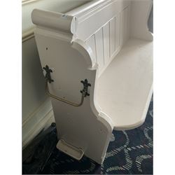 Small painted pew, with umbrella stands- LOT SUBJECT TO VAT ON THE HAMMER PRICE - To be collected by appointment from The Ambassador Hotel, 36-38 Esplanade, Scarborough YO11 2AY. ALL GOODS MUST BE REMOVED BY WEDNESDAY 15TH JUNE.