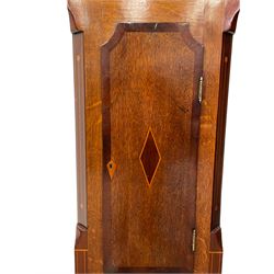 Musson of Louth - mid-19th century oak and mahogany 8-day longcase clock, with a swan’s neck pediment and ball and spire brass finial, break arch hood door flanked by reeded pilasters with brass capitals, canted angled trunk, flat topped door with concave corners, rectangular plinth on bracket feet, fully painted break arch dial with Roman numerals and minute track, subsidiary seconds dial and calendar aperture, matching stamped brass hands, eight day rack striking movement with anchor escapement. With weights and pendulum.
H206 W44 D23
Balthazar Musson from Baden (Germany) is recorded as working in Louth from 1835, naturalised 1861-8. Succeeded by his son, George Balthazar 1872-1920. 
