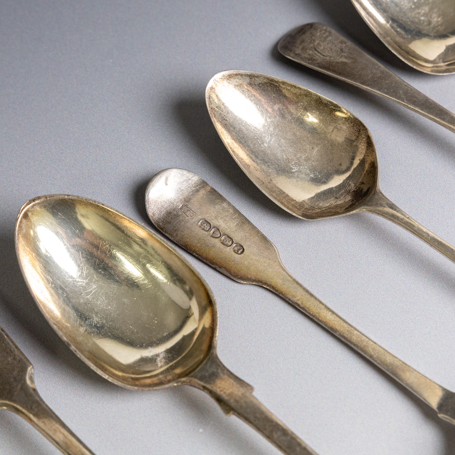 Collection of silver flatware, comprising set of six Georgian teaspoons, three Victorian Exeter silver dessert forks, Georgian Old English pattern table spoon, etc all hallmarked