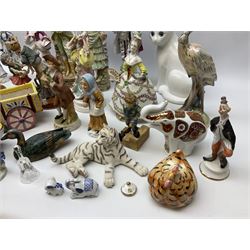 Quantity of composite and ceramic figures to include three Lilliput Lane models of cottages, continental figures, animal figures etc in two boxes