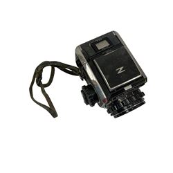 Zenza Bronica S2A medium format camera body, with Nikkor-P '1:2.8 f-75mm' lens, Zenza Bronica Zenzanon MC '1:3.5 f-150mm lens, Zenza Bronica Tele-Converter-E 2x, and two additional film cases. in a Billingham camera bag