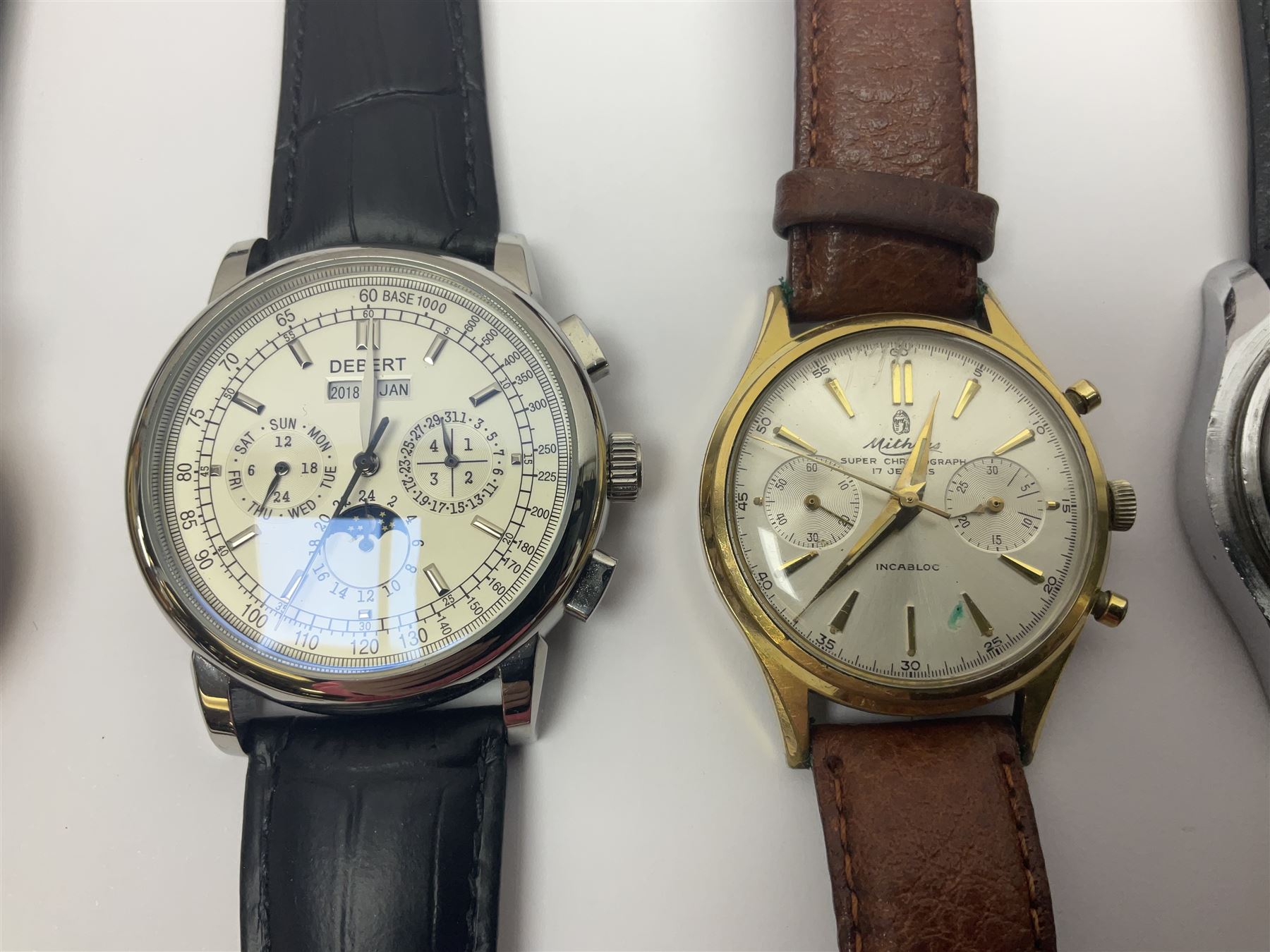 Three automatic wristwatches including Seiko, Debert chronograph and Swiss Emperor and four manual wind wristwatches including Chronograph Swiss, Interpol, Mithras chronograph and Oris