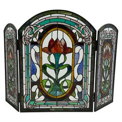 Art Nouveau design stained glass three panel fire screen, decorated with tulips and interlacing borders