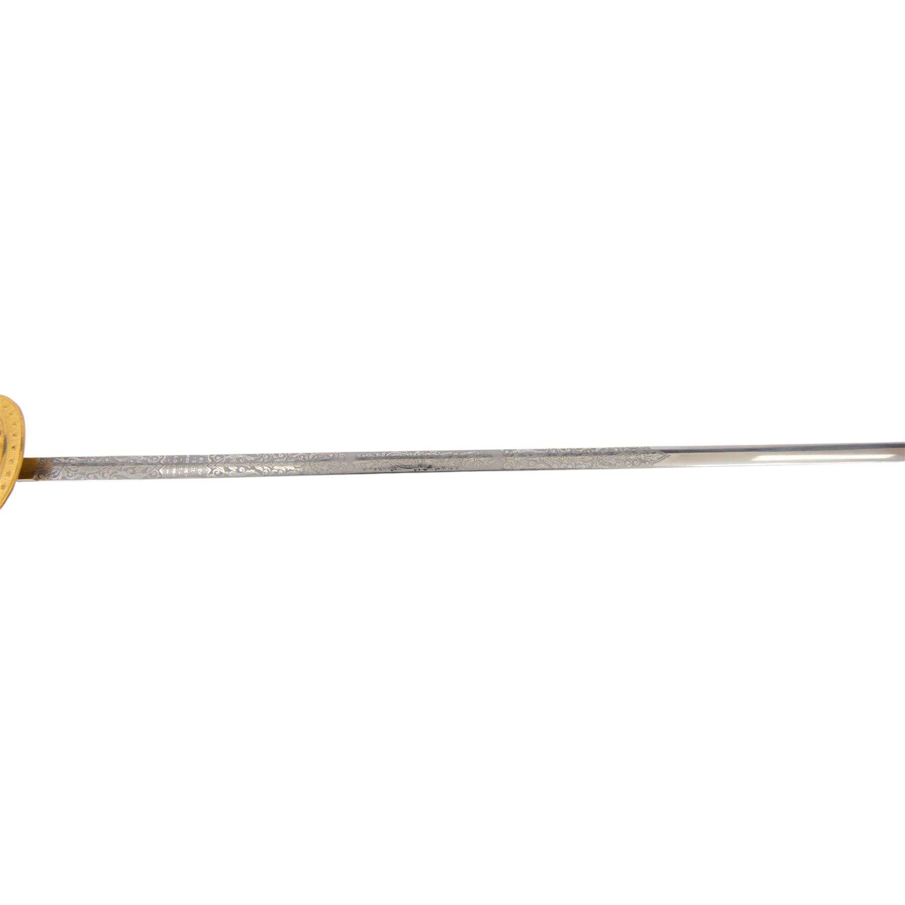 British Victorian court sword, for members of the Royal Household, by W.K & C of Solingen and retailed by Besch of Hanover St London, the 80cm blade etched to both side, the single bar hilt of gilt brass with Queens' crown pommel and downturned shell guard with the monogram of Queen Victoria, the wooden grip covered with silver wire, within leather scabbard with three gilt brass mounts and twin suspension rings, overall L96cm   