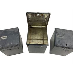 Three metal ballot boxes 