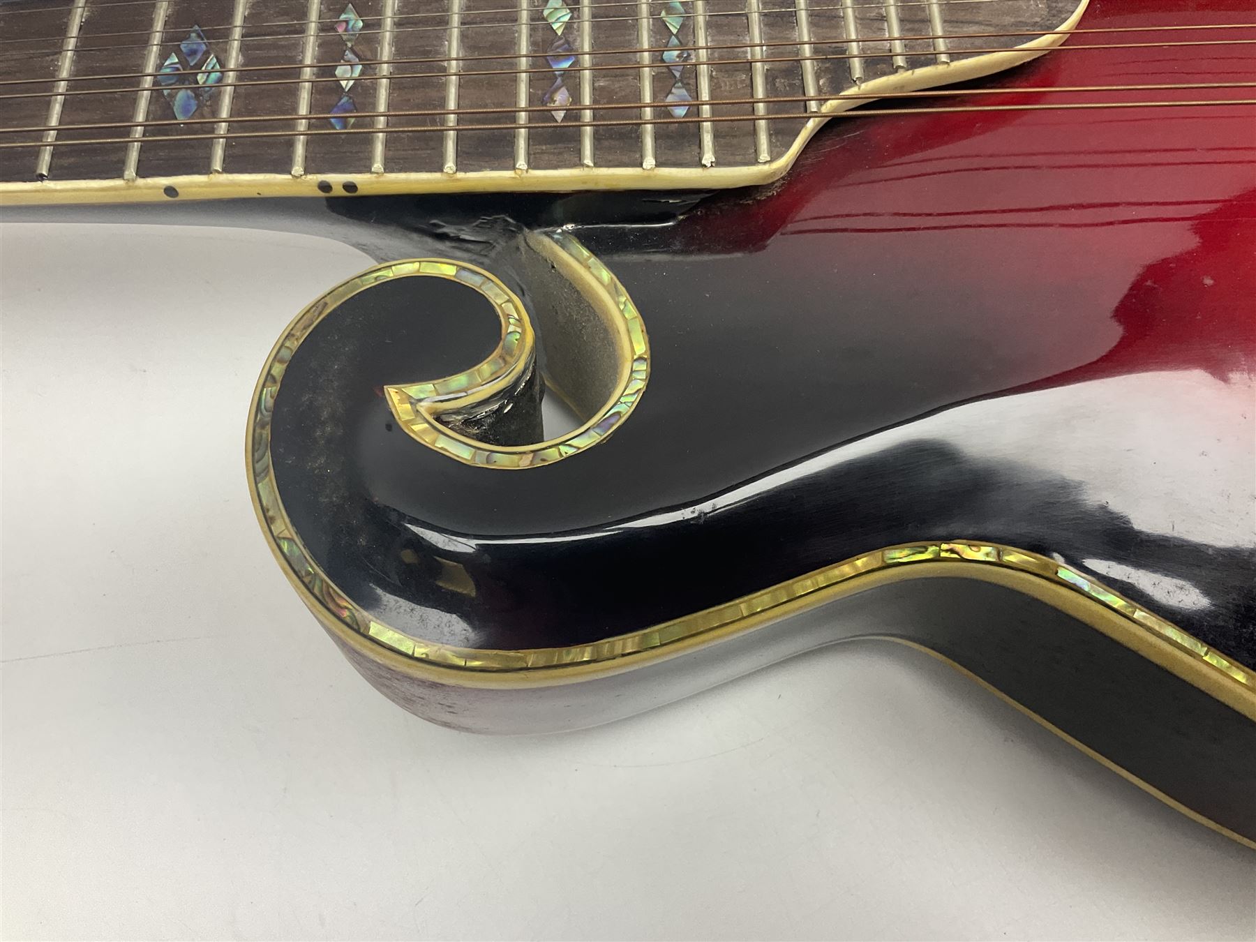 Eastern eight-string mandolin with red sunburst finish and mother-of-pearl inlay of eagles, clouds, trees etc L86cm; in fitted hard carrying case