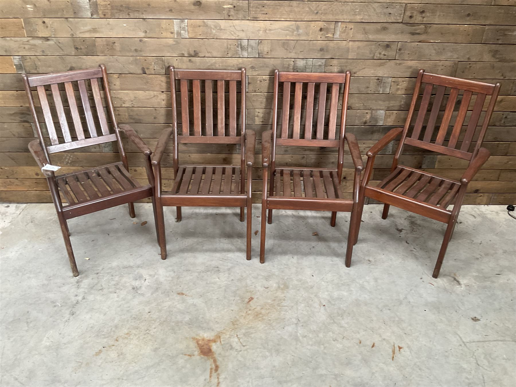 Set of eight hardwood garden armchairs