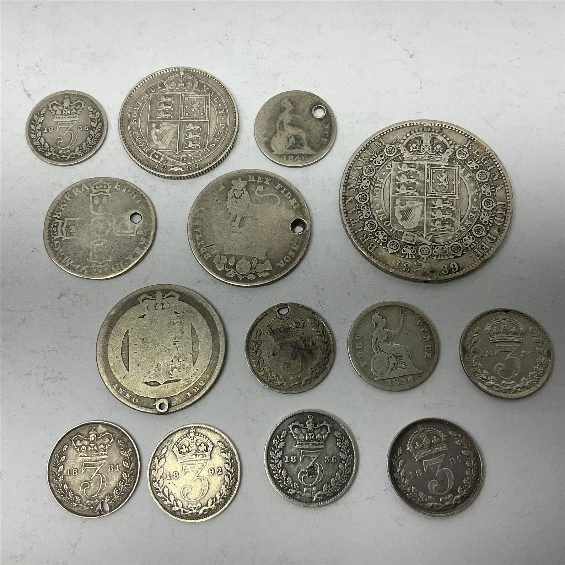 Approximately 200 grams of Great British pre 1920 silver coins, mostly previously mounted or holed, including crowns, half crowns etc
