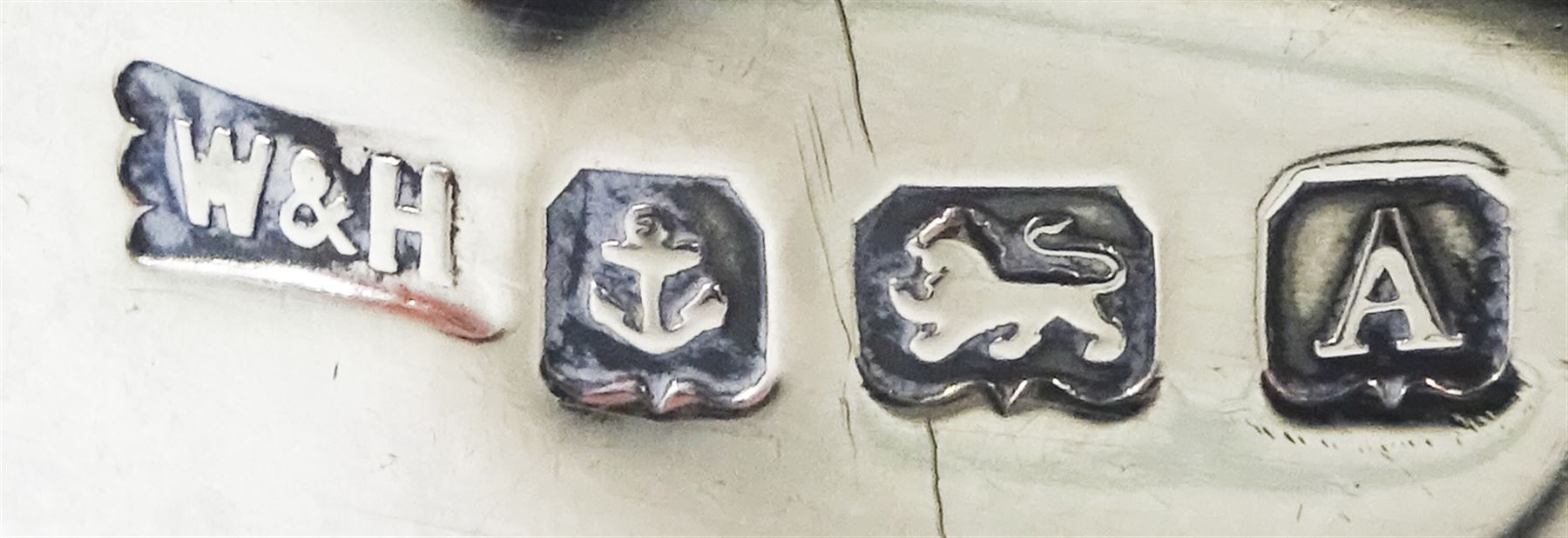 1920's silver christening mug, of plain form with engraved monogram and date to body and scroll handle, upon a circular stepped foot, hallmarked Walker & Hall, Birmingham 1925, H8.5cm, together with a Victorian silver three piece christening set, comprising knife, fork and spoon with beaded edge, hallmarked London, probably 1865, makers mark indistinct, contained within a fitted case with blue silk and velvet lined interior, approximate total silver weight 6.26 ozt (195 grams)