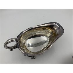 Silver plated seven bar toast rack by Mappin & Webb, together with other silver plated items including pair of bottle coasters, swing handled baskets and two sauce boats