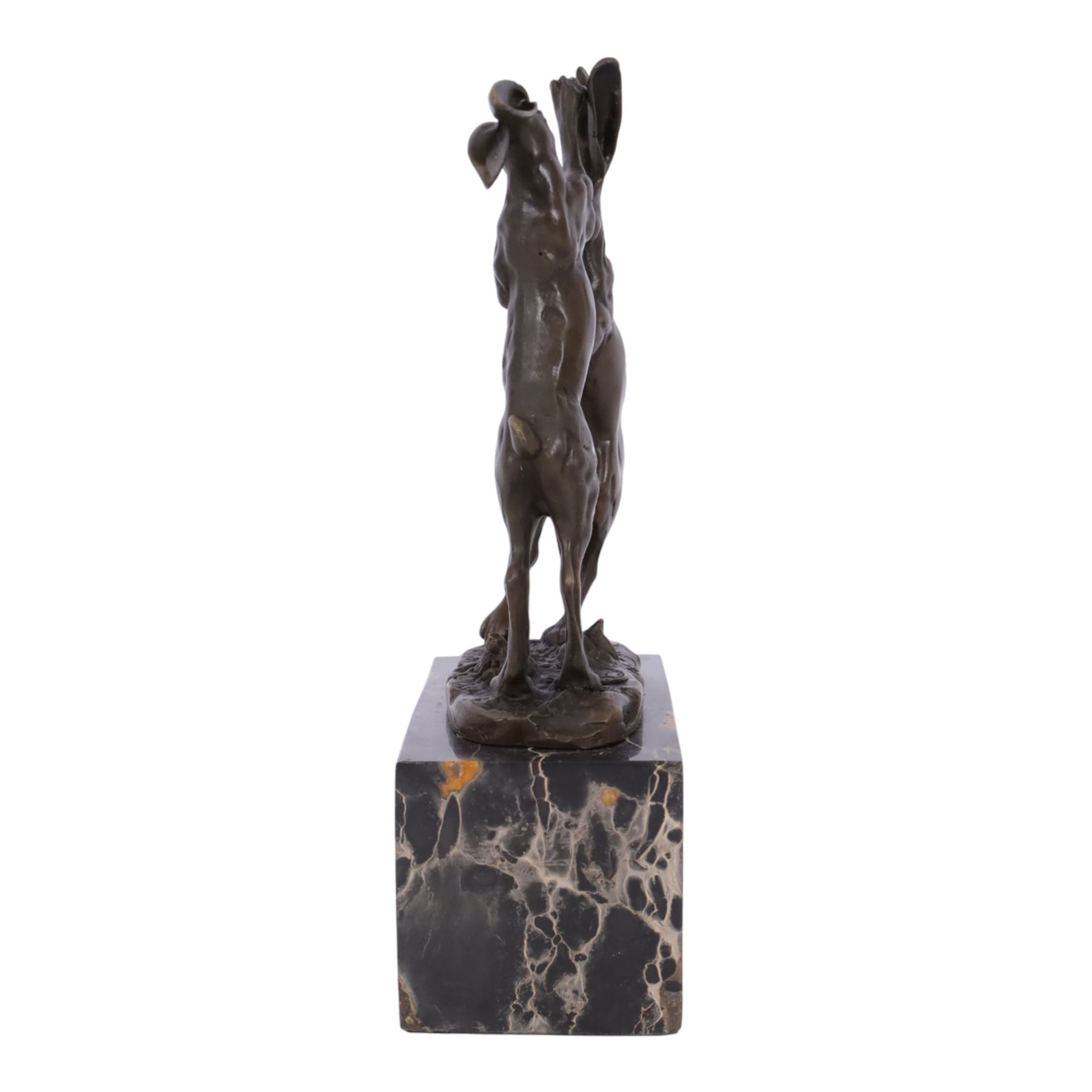 After Mario Nick; two hares boxing, bronze figure group, signed Nick and bearing foundry mark, upon rectangular plinth, overall H23.5cm