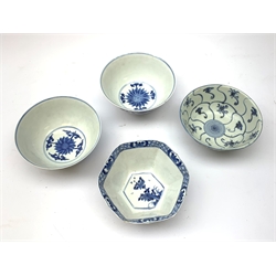  Four blue and white Chinese tea bowls, comprising an 18th century example, with Tek Sing auction label beneath, D16cm, a pair decorated with Chinese dragons, (a/f), each with six character mark beneath, and hexagonal form example, with six character mark beneath.   