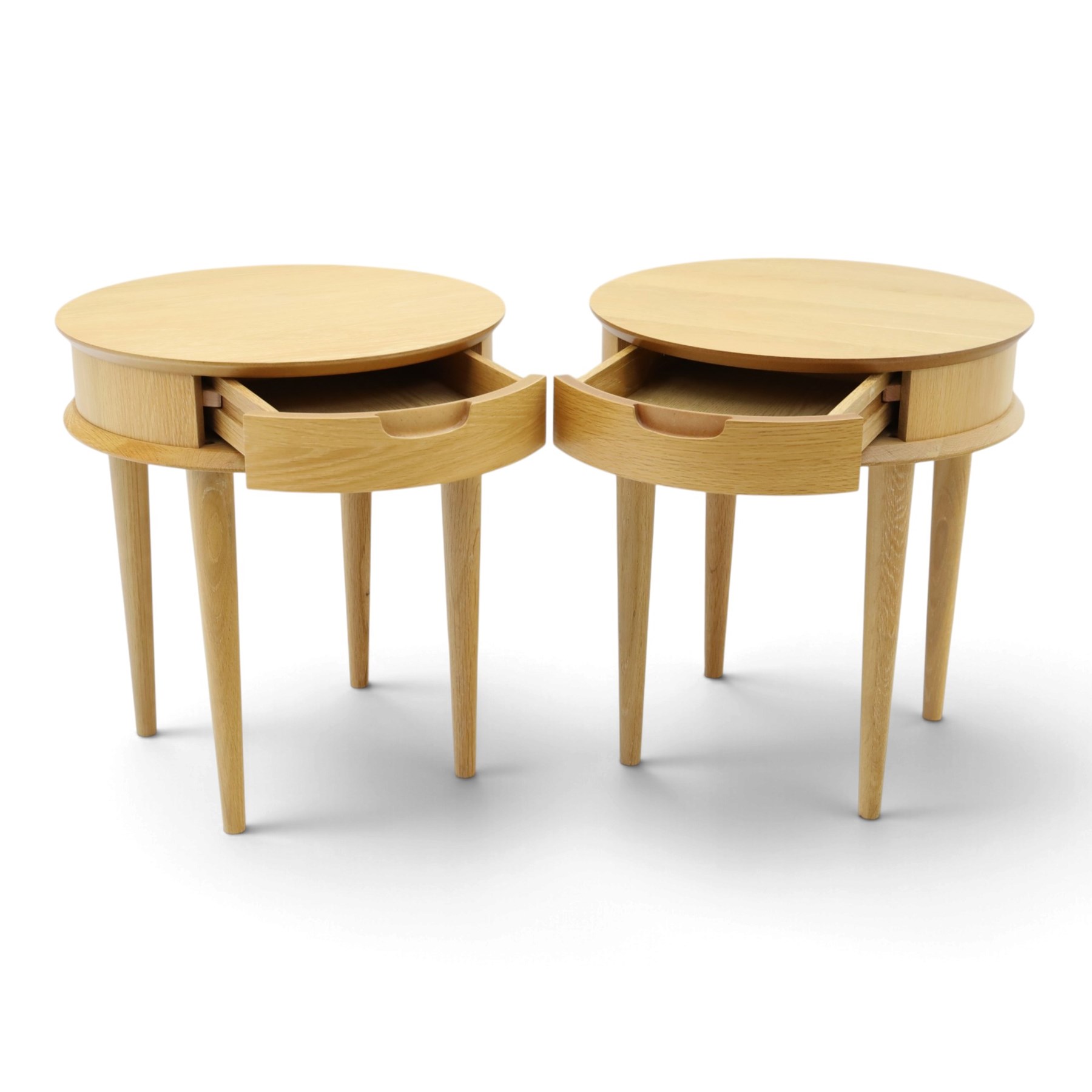 Bentley Designs - Pair of 'Dansk' light oak circular bedside or lamp tables, one drawer with recessed handle, tapering circular supports