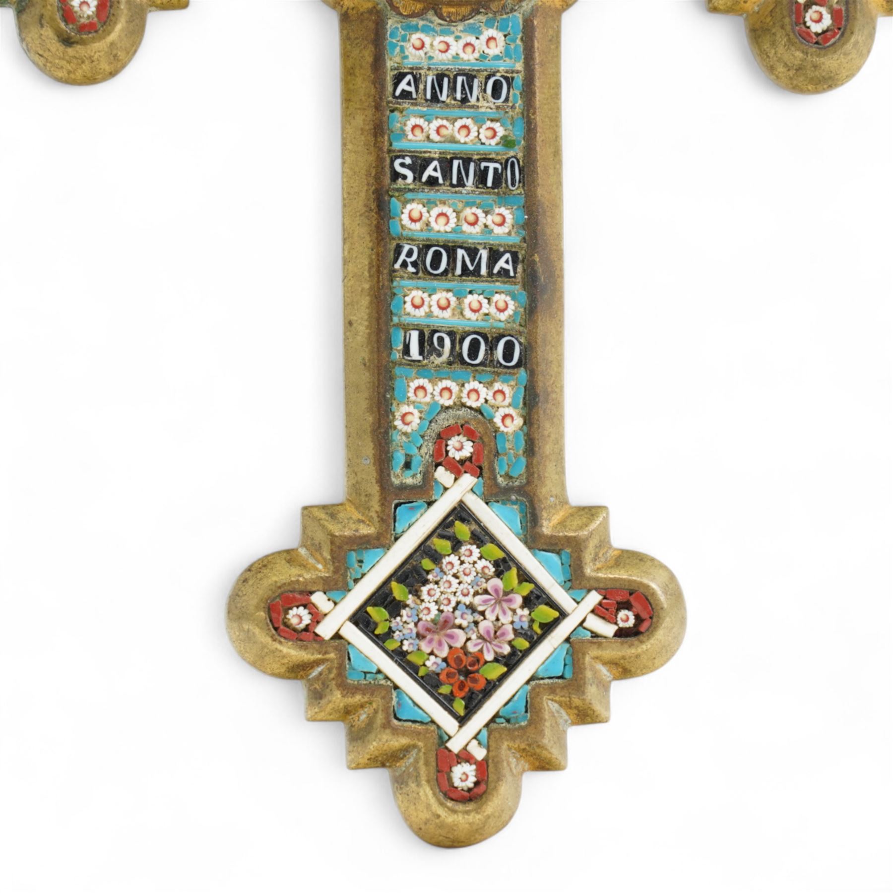 Italian micro mosaic cross, the central panel depicting a solitary female figure, each point decorated with sprigs of flowers, the inscription reading 'Anno Santo Roma 1900', H14cm