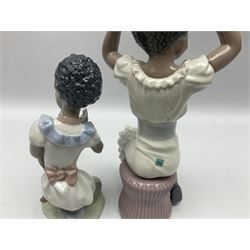 Three Lladro figures, comprising Rhumba, no 5160, year issued 1982, Sing With Me no 5837 and Sharing Sweets no 5836, all with original boxes, largest example H24cm