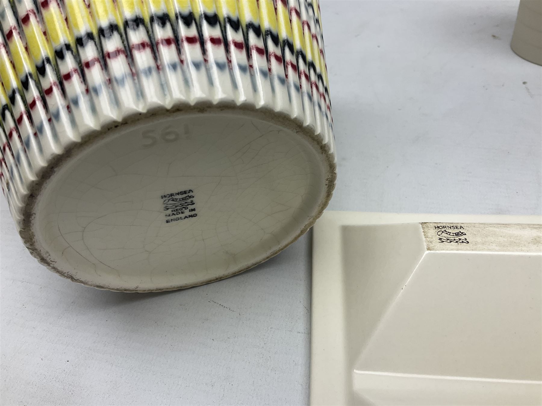 Hornsea Pottery Rainbow planter by John Clappison, together with two Horsea Concept vases with flower holders and Hornsea Stadium dish, largest example H16cm