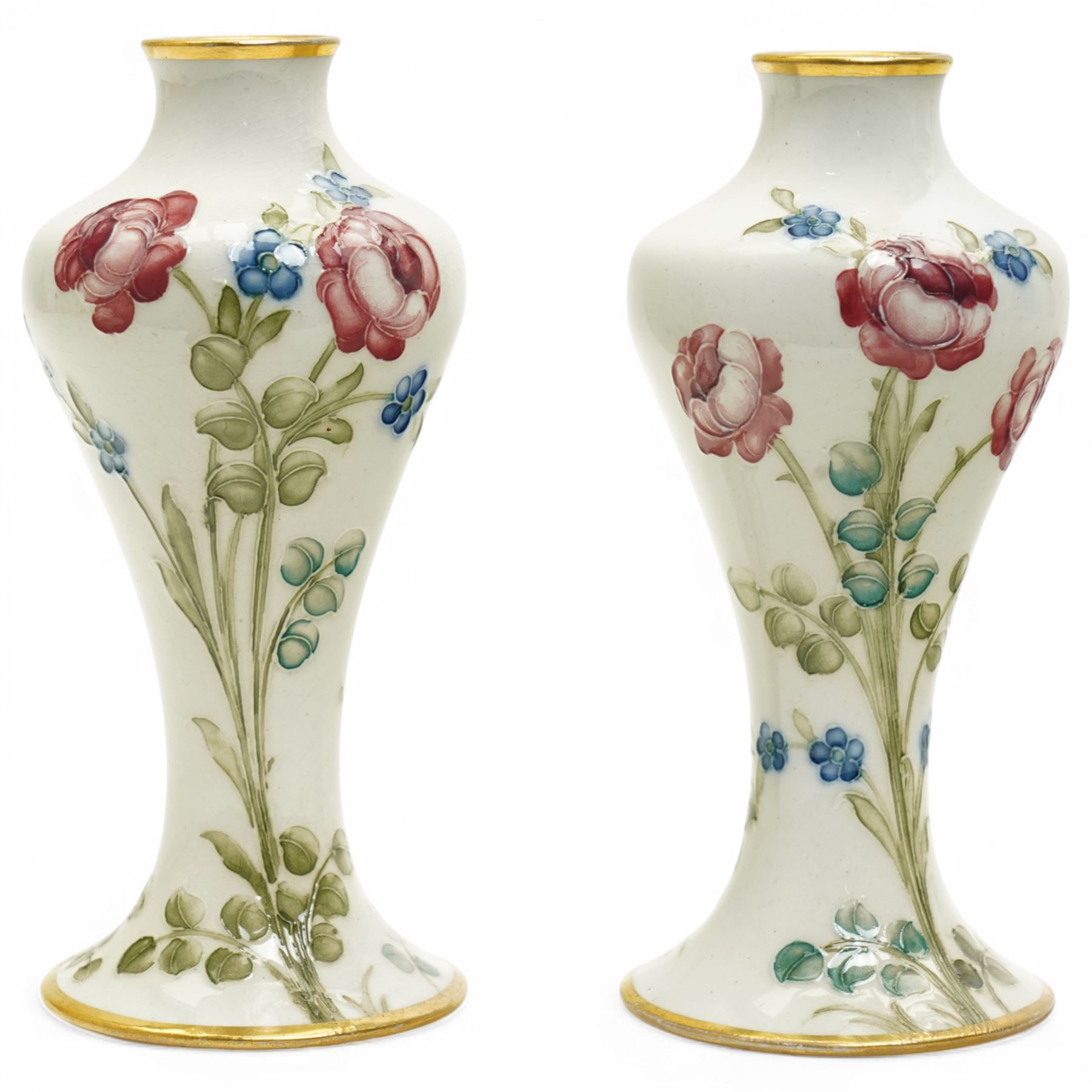 William Moorcroft for James Macintyre & Co, pair of small shouldered vases decorated with blossoming roses, burslem brown mark and Moorcroft signature to base, H15cm (2)
