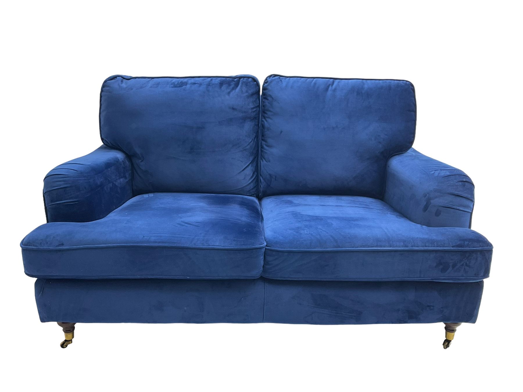 Howard Design Two Seat Sofa Upholstered In Blue Fabric Traditional Shape With Rolled Arms On Walnut Finish Turned Feet Brushed Metal Cups And Castors The Furnishings Furniture Interiors