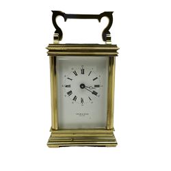 English - late 20th century 8-day carriage clock by Taylor & Bligh, in an Anglaise case with a rectangular handle, bevelled glass panels and enamel dial with Roman numerals, minute markers and steel moon hands, timepiece spring driven movement with a jewelled lever platform escapement. With key.