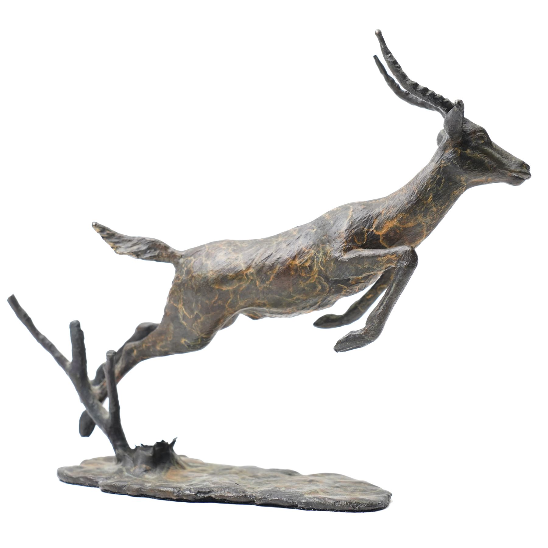 Bronze figure of a leaping impala, W20cm 