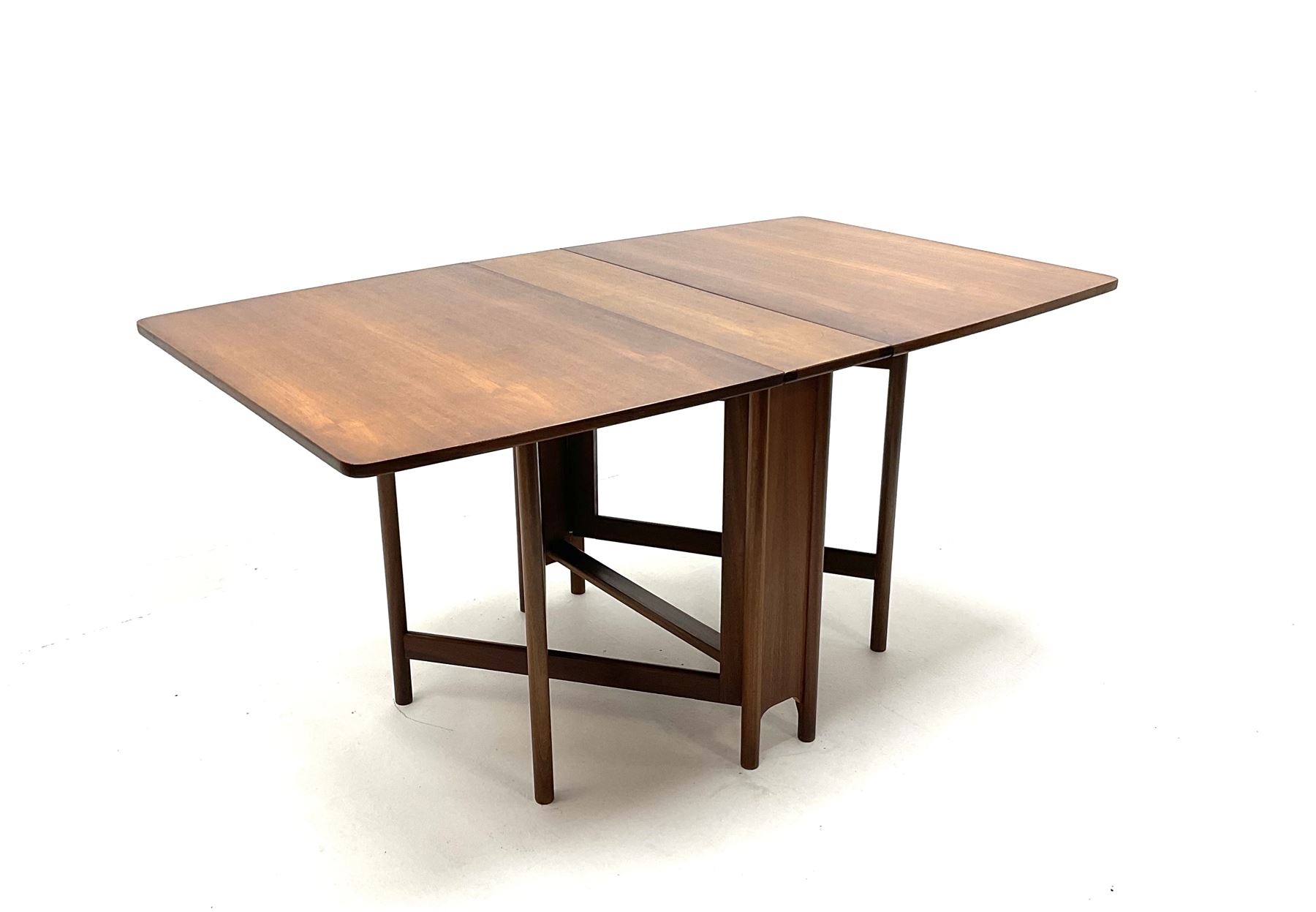 Mid 20th century narrow teak drop leaf table, slide out ‘X’ framed turned supports 