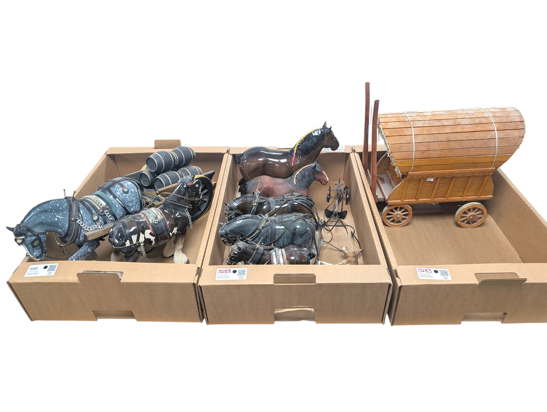 Collection of Shire horses, including Beswick and Sylvac examples, one with wooden cart and one with caravan, together with a Beswick donkey figure