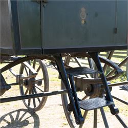 The Zetland Body Break by Peters & Sons, London

A fine and substantial late nineteenth century body break by Peters & Sons of London, circa 1880, formerly owned by the Marquis of Zetland. The carriage is finished in dark olive green and black with red, black and yellow lining, and is fitted with an elevated coachman’s box seat above a forward luggage compartment. The open rear body is entered by side doors and arranged with opposing longitudinal passenger seating.

The carriage is mounted on English pattern wooden artillery wheels with iron tyres and is carried on full elliptic springs, with a transverse helper spring behind. The front axle is fitted with fifth wheel turntable steering. The rear passenger compartment has upholstered longitudinal side benches beneath padded back rails, with turned spindle upper panels to the side doors and rear handrails. The driver’s seat is upholstered in corded fabric and secured with leather retaining straps.

Details include shaped splinter bar and turntable, folding rear step below the door with leather covered interior handle, luggage rails to either side, pole fittings for use with a pair or team of horses, and a handbrake with brake blocks operating to both rear wheels. The wheel hubs are fitted with polished hub caps engraved “Peters & Sons, London”. The exterior retains small Zetland family crests to the side panels.

The carriage has been conserved by Woods of Fairbourne Carriages Ltd and is recorded as Lot 146 in The George Shaw Collection sale, 5 November 2003, where it was catalogued as The Zetland Body Break and described as having previously been owned by the Marquis of Zetland.

Features
• Peters & Sons, London coachbuilder’s hub caps
• Known as The Zetland Body Break
• Formerly owned by the Marquis of Zetland
• Circa 1880
• Conserved by Woods of Fairbourne Carriages
• Dark olive green and black bodywork with red, black and yellow lining
• Elevated coachman’s box seat
• Forward luggage compartment
• Open rear passenger body with side doors
• Opposing longitudinal passenger seating
• Turned spindle upper panels to the side doors
• Folding rear step with leather covered interior handle
• Full elliptic spring suspension with transverse helper spring behind
• Fifth wheel turntable steering
• Handbrake with brake blocks operating to both rear wheels
• Wooden artillery pattern wheels with iron tyres
• Shaped splinter bar and pole fittings for a pair or team of horses
• Small Zetland family crests to the side panels

Provenance
The George Shaw Collection, 5 November 2003, Lot 146. Previously owned by the Marquis of Zetland.

Conservation

Conserved by Woods of Fairbourne Carriages.

Dimensions:
Overall length: 310 cm
Width: 176 cm
Height: 226 cm

Front wheel diameter: 98 cm
Rear wheel diameter: 140 cm

Seating:
Driver's box seat: 2 persons

Rear passenger compartment: Two longitudinal benches accommodating approximately 8 to 10 passengers