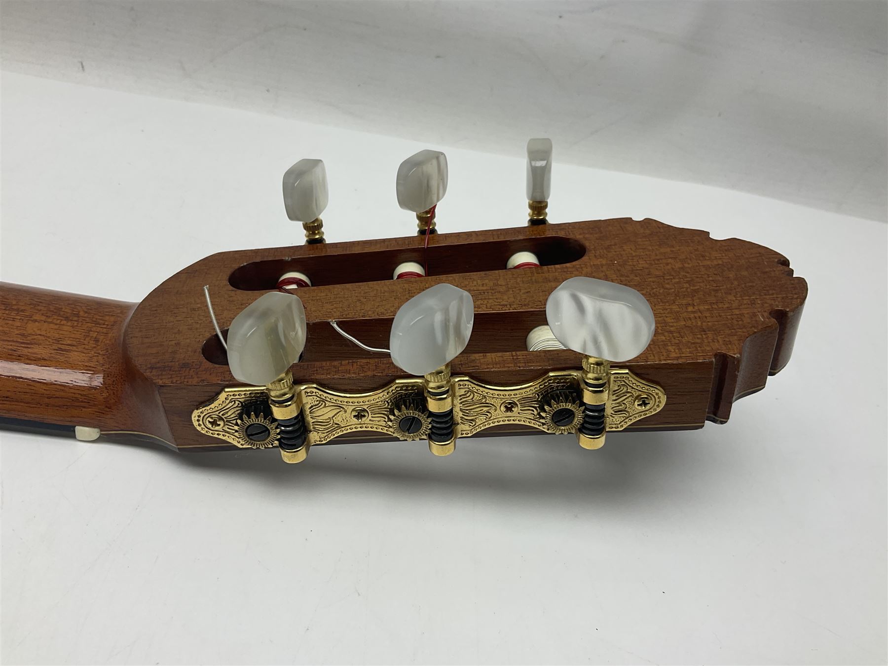 British hand made classical acoustic guitar by Huw Morgan with Indian rosewood back and sides and spruce top; bears label dated May 1998; L100cm; in Tribal Planet lightweight carrying case