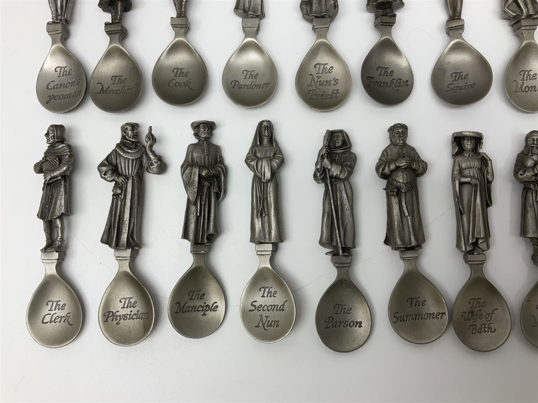 Set of forty three miniature Franklin Mint pewter figures of the Kings and Queens of England, with certificate of authenticity and information cards, together with a collection of twenty four Franklin Mint pewter Charles Dickens character spoons