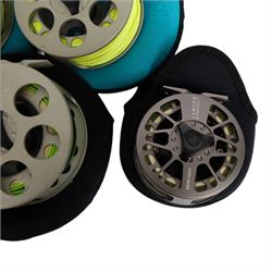 Five Lamson Litespeed fly reels, comprising LS4, two LS2, two LS3.5, all within Lamson soft pouches