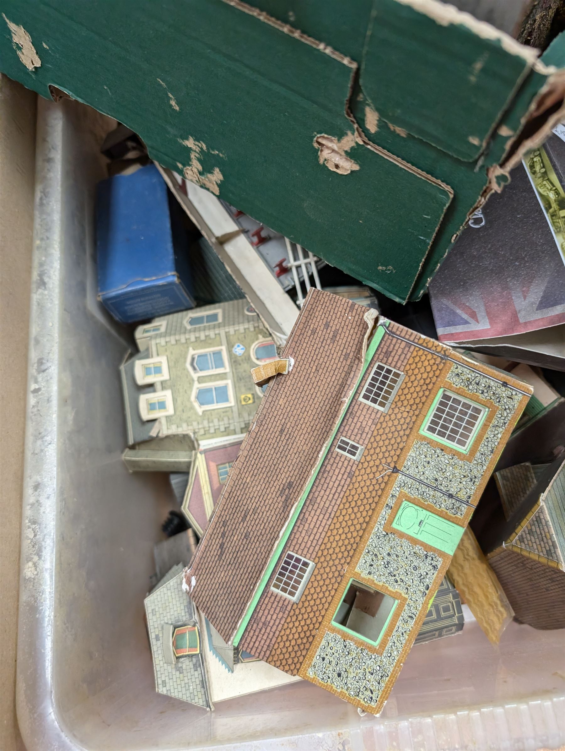 Collection of model railway buildings and other accessories, together with a box empty Hornby boxes, including three trainset boxes with pieces of track inside only