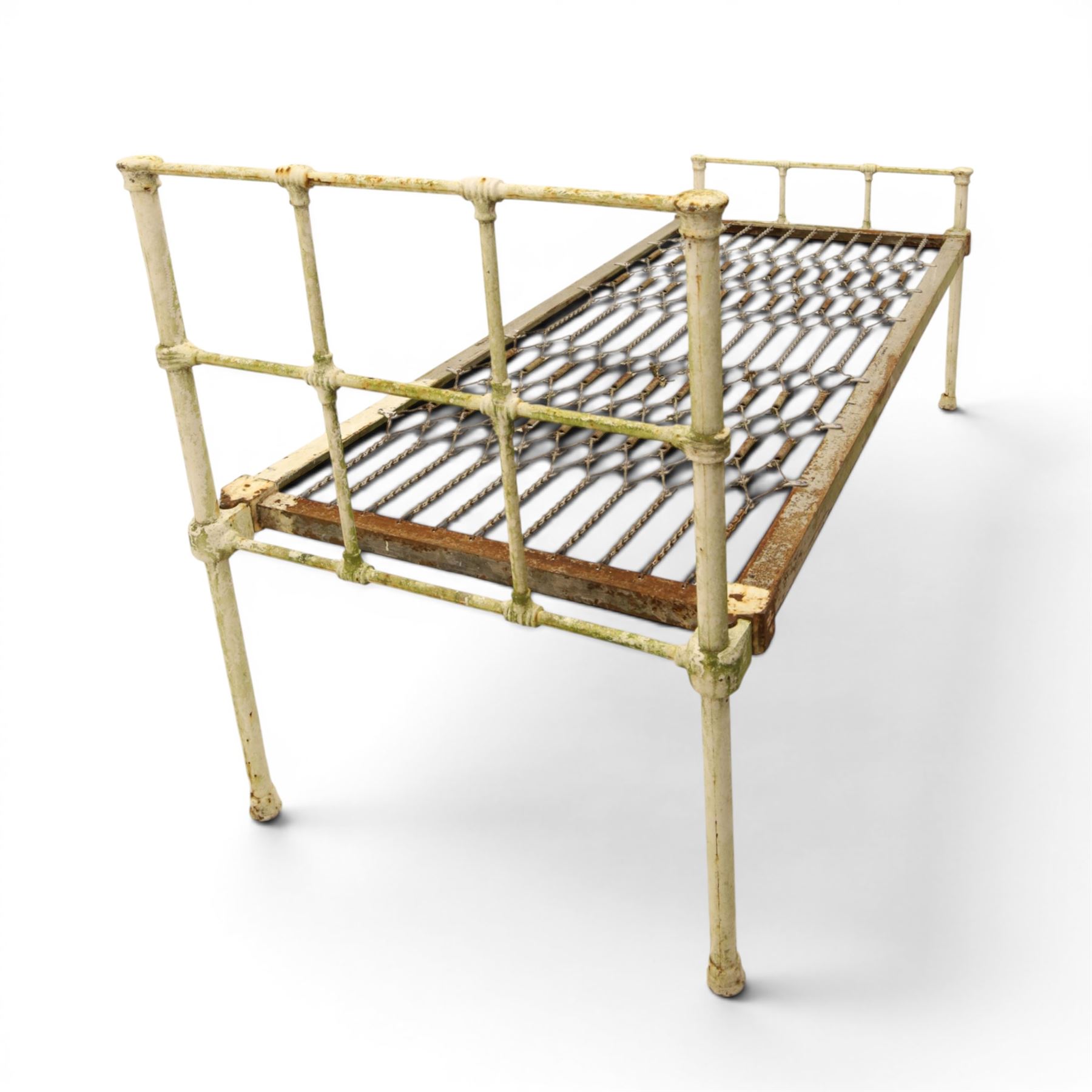 19th century wrought iron single bed, white frame with knot details, frame with wire and spring supports
