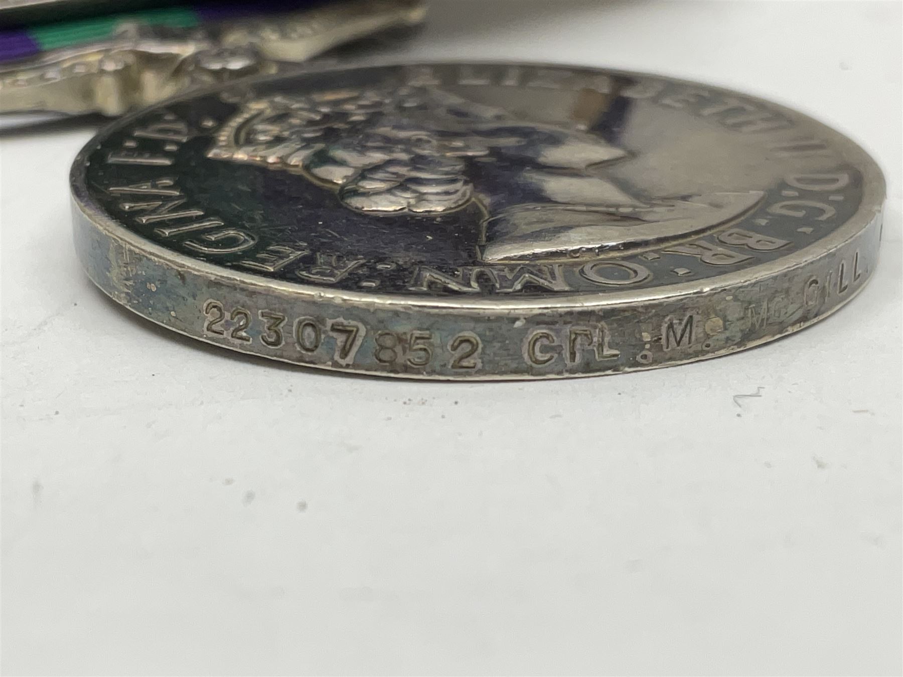 Korean War group of three medals comprising ERII Korea Medal awarded to 22307852 Pte. M. McGill R.A.M.C., UN Korea Medal and ERII General Service Medal with Malaya clasp to 22307852 Cpl. M. McGill R.A.M.C.