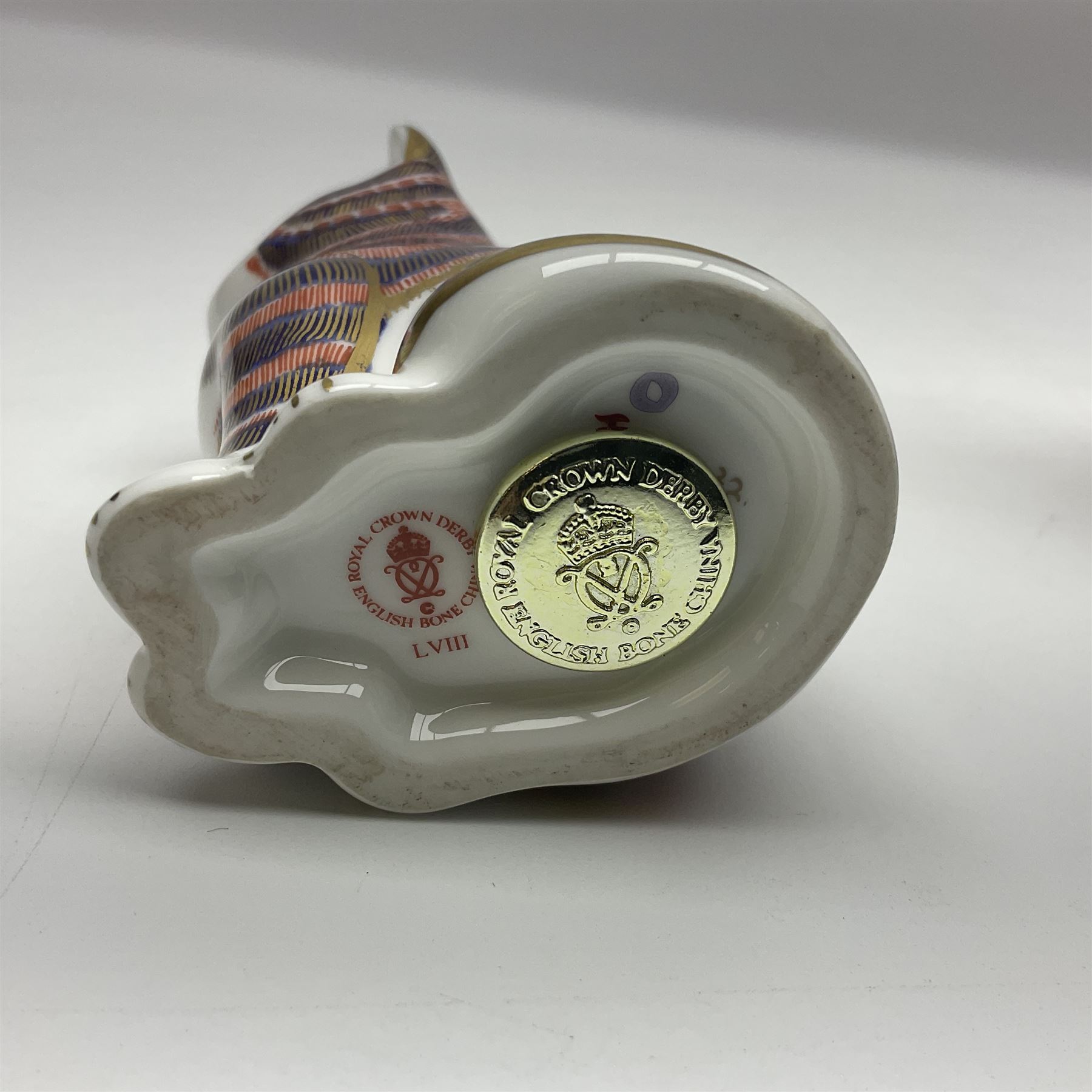 Three Royal Crown Derby paperweights, comprising of three cats, all with gold stoppers and printed mark beneath 