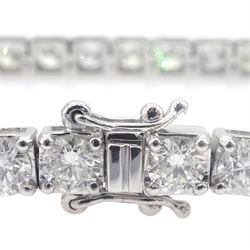 White gold round brilliant cut line bracelet, stamped 18K, total diamond weight approx 11.25 carat