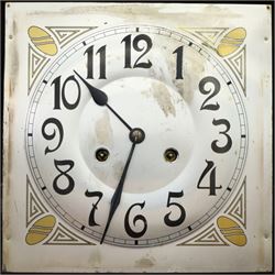 Art Deco style oak wall clock, moulded cornice above a silvered dial with Arabic numerals and geometric spandrels, glazed door with geometric bevelled glass panels enclosing a circular pendulum, on a stepped moulded base