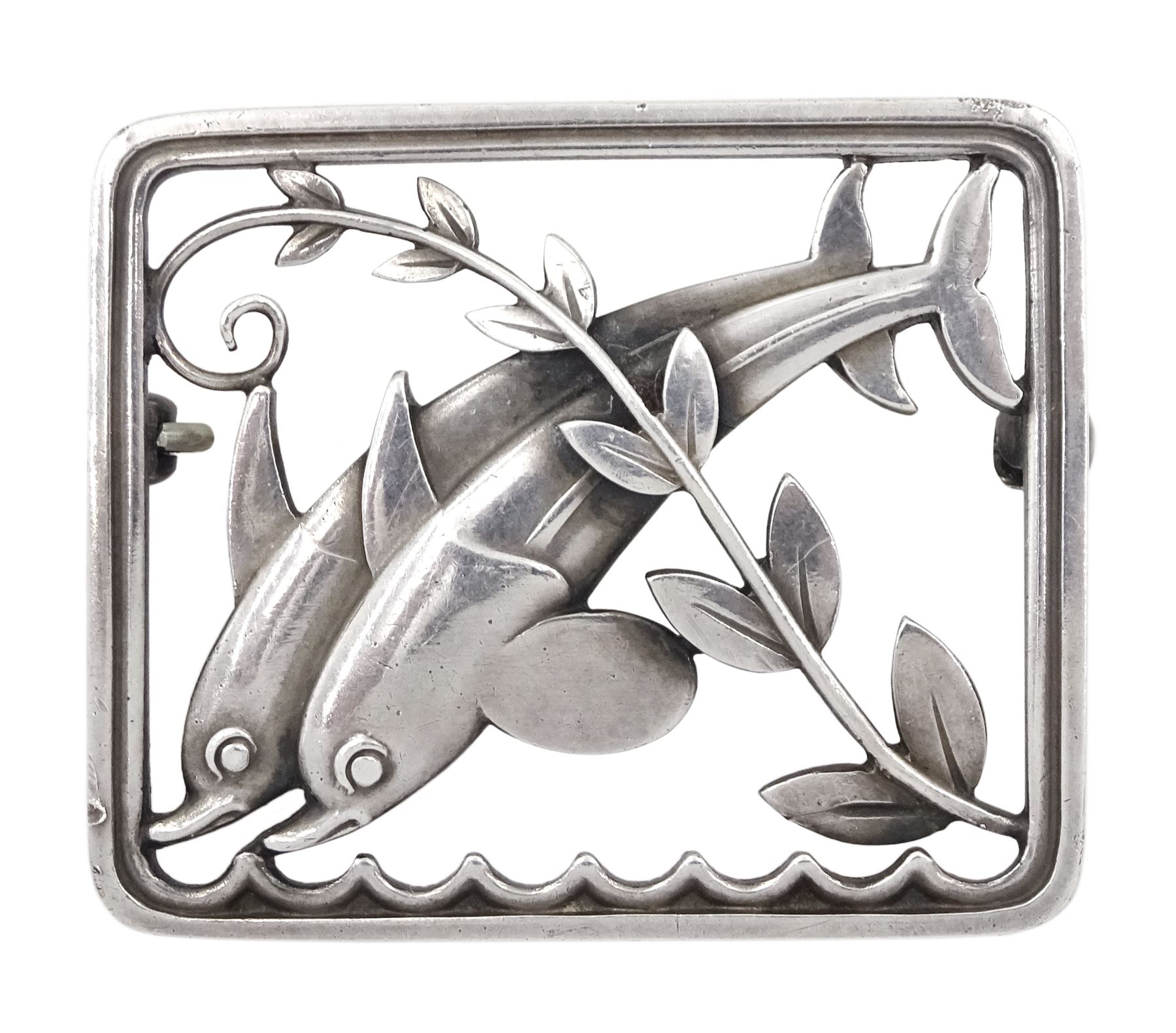Silver double dolphin brooch designed by Arno Malinowski for Georg Jensen, No. 251, London 1952