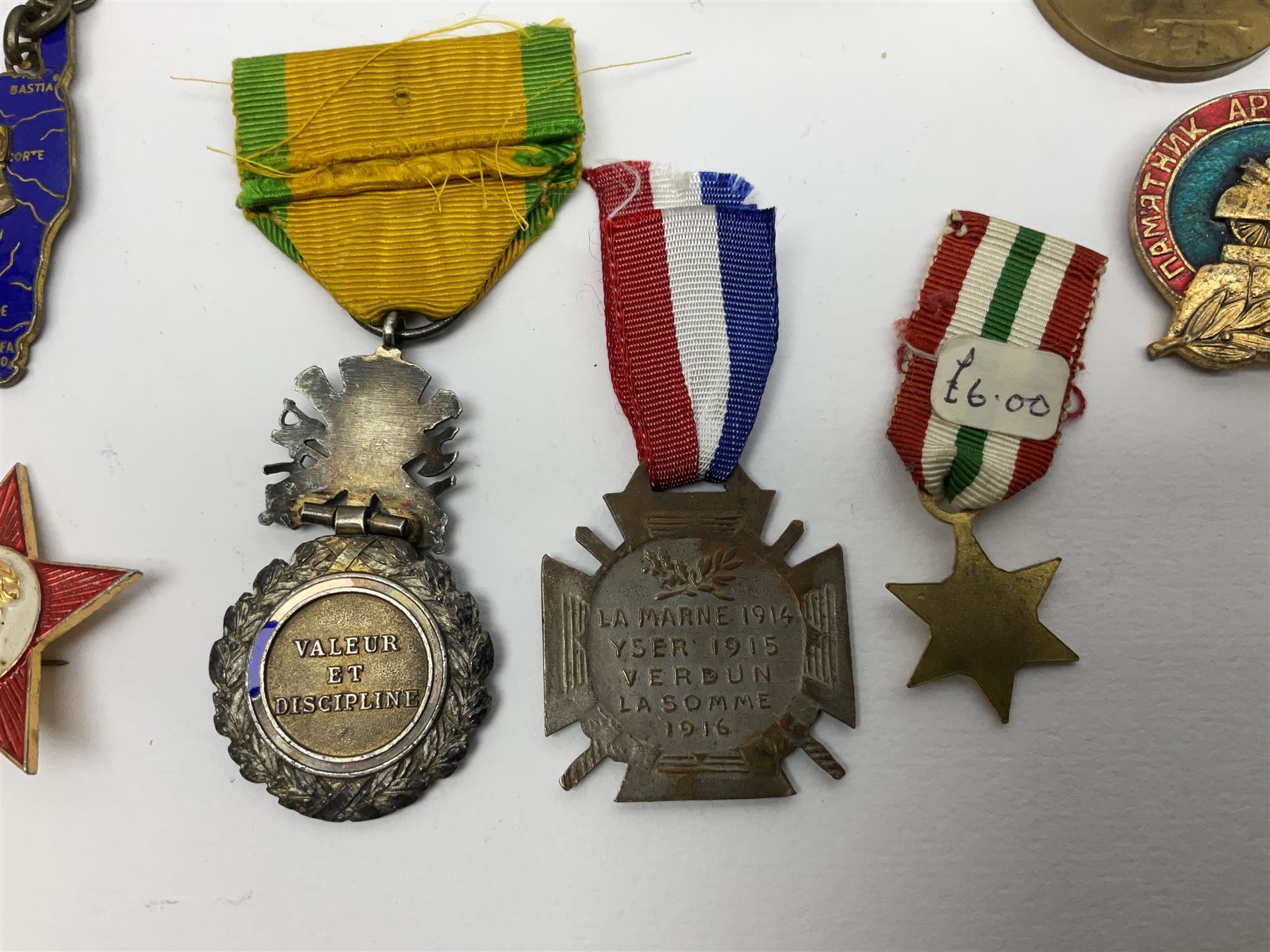 Five WW1 French medals comprising Medaille Militaire Gallantry Award, two Croix de Combattant, Medaille Commemorative Francais 1914-18 and a Patriotic Medal; together with small quantity of Russian badges etc