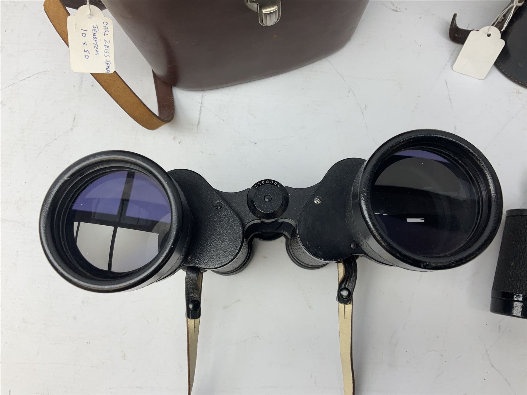 Three pairs of Carl Zeiss Jena binoculars, Jenoptem 10x50W, Jenoptem 8x30W and Jenoptem 10x50, all cased (3)
