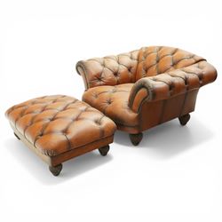 Tetrad England - large armchair upholstered in buttoned leather, with stool