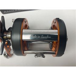 Three multiplier spool sea fishing reels, to include Swedish Abu Ambassaduer 700c Black, with spare spool, Swedish Abu Garcia Ambassadeur 6500 C3 CT MAG and Penn 515 MAG2, all boxed