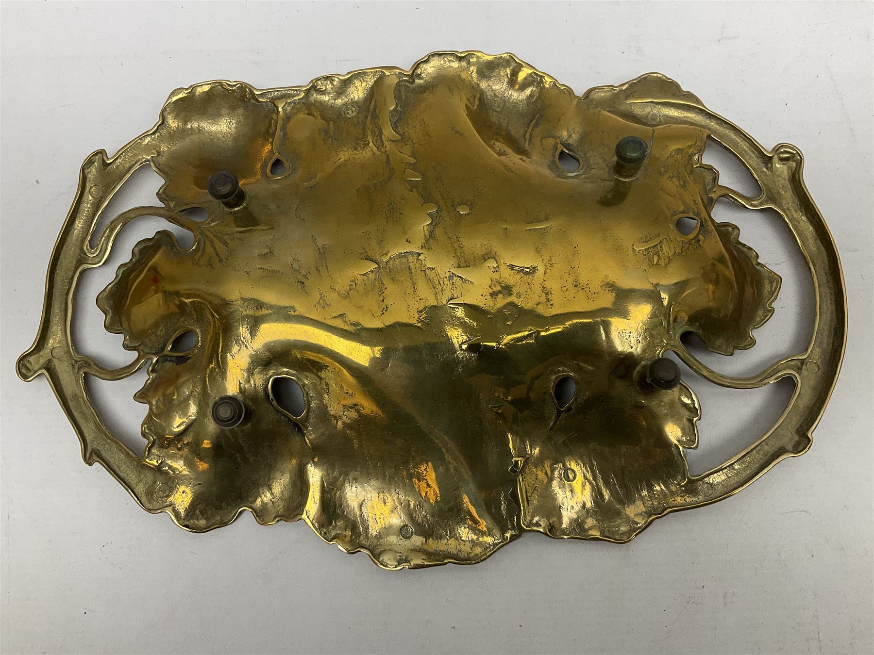 Late 19th/early 20th century twin handled brass centrepiece dish in the form of oak leaves, raised upon four legs, L37cm