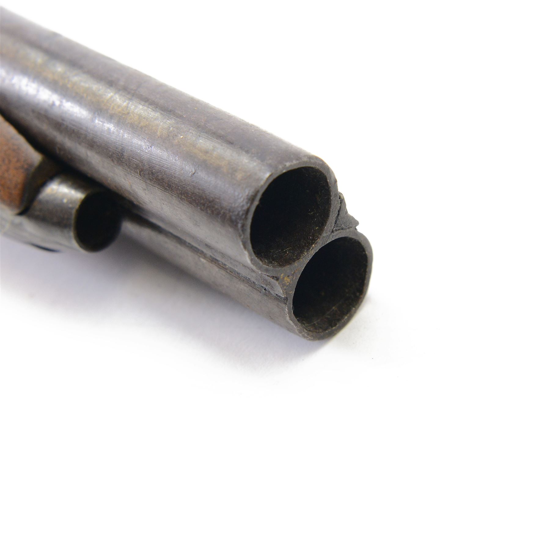 Mid 19th century double-barrelled Italian percussion pistol, smooth, round, 14 mm cal. barrels, forward spring lock engraved with floral motifs; wooden stock with grooved butt and engraved iron mounts, L35cm