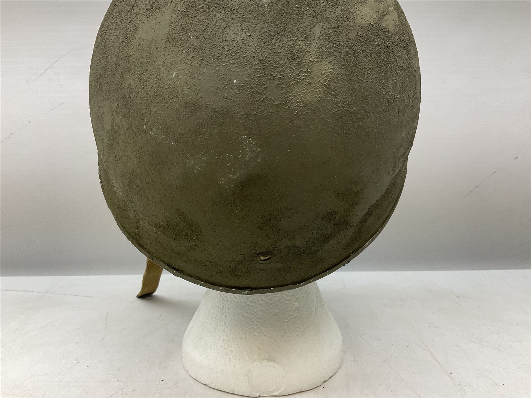 Post-WW2 British Airborne Troops,/Paratroopers Steel Helmet with green textured paint finish, leather and sponge liner and three point chinstrap mounting; liner marked BMB II 1953 71/4
