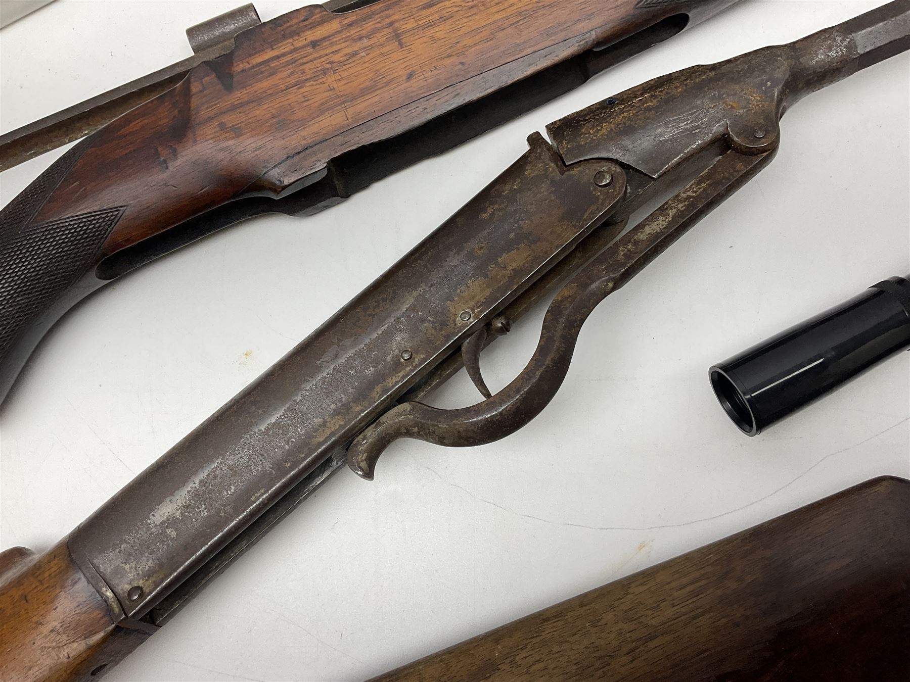 Assorted rifle and pistol spares; early Gem air rifle with sawn off barrel (piece present); telescopic sight; canvas/leather ammunition pouch; Mauser stock; barrel browning solution etc